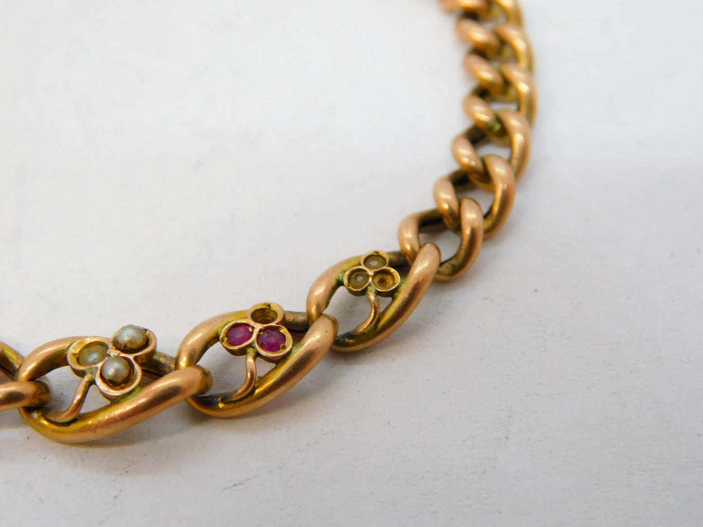Edwardian 9ct Rose Gold, Ruby, Seed Pearl Shamrock Form Bracelet Antique c1910