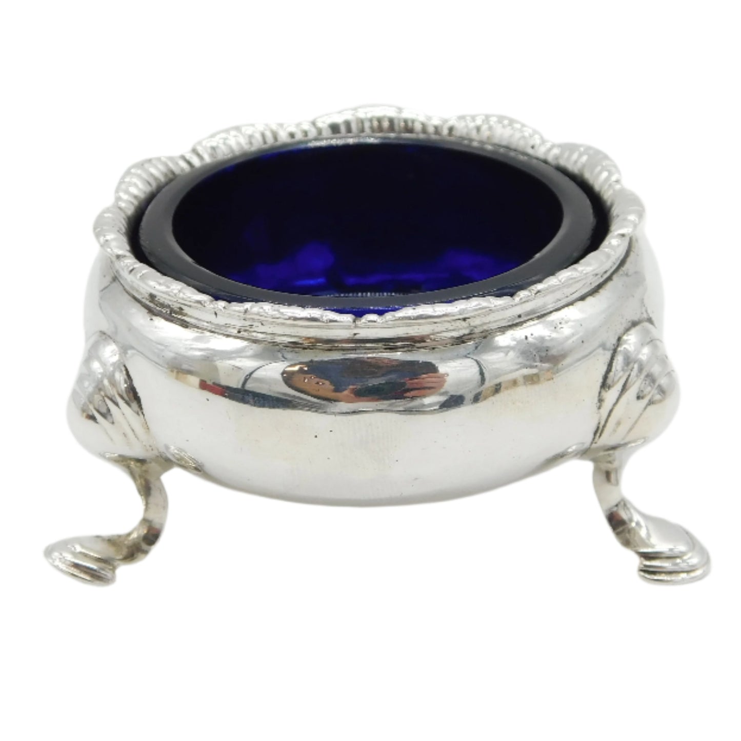 Silver container with blue interior on a white background