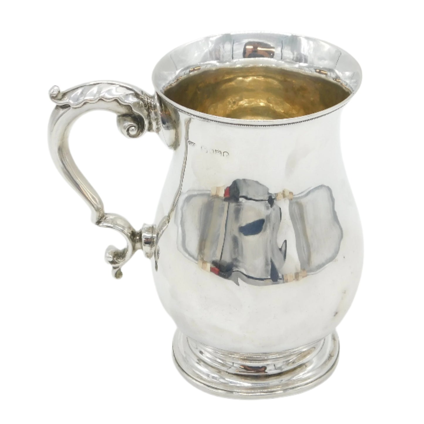 Silver mug with a reflective interior on a white background