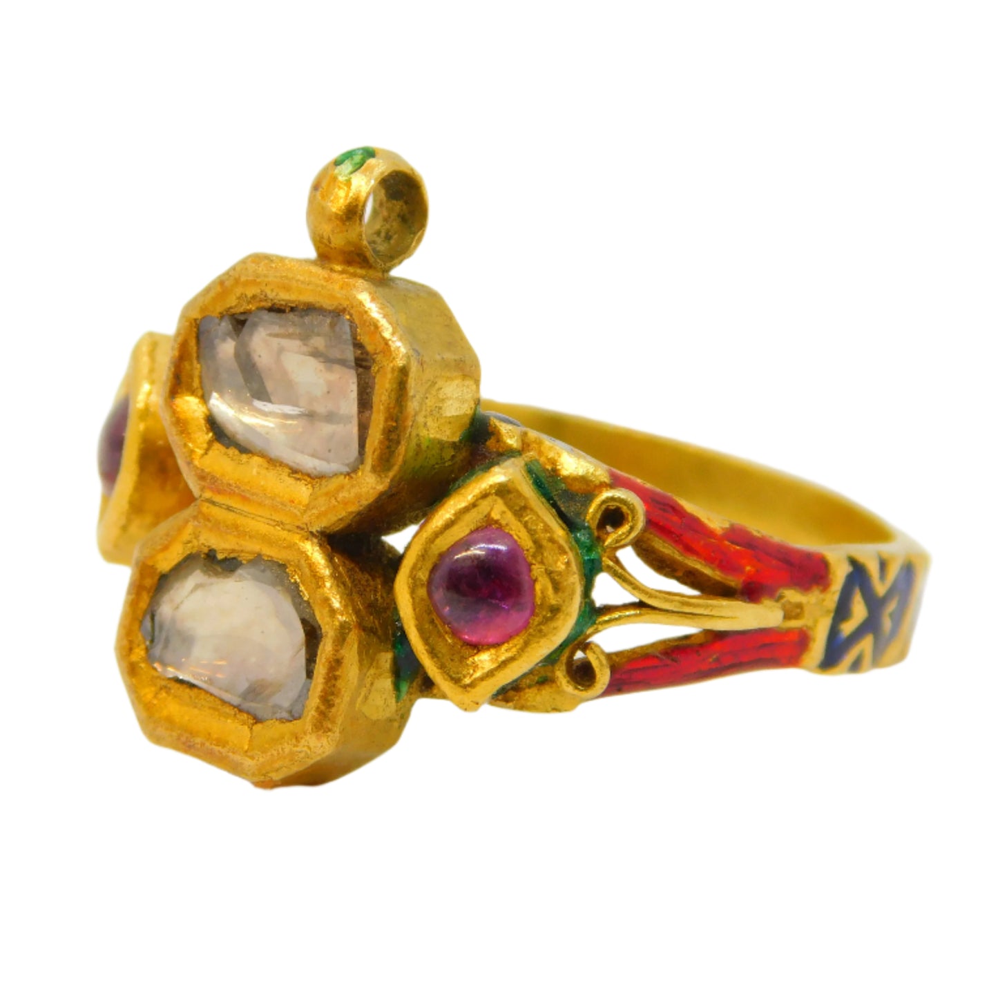 Gold ring with gemstones on a white background