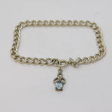 Sterling Silver Curb Link Bracelet with Topaz Knot Charm Vintage c1970s