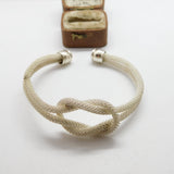 Sterling Silver Modernist Textured Lovers Knot Form Bangle Bracelet Vintage