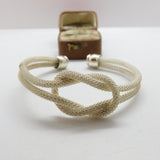 Sterling Silver Modernist Textured Lovers Knot Form Bangle Bracelet Vintage