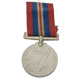 WWII 1939-1945 War Service Medal J.J.L. Loure NS Antique