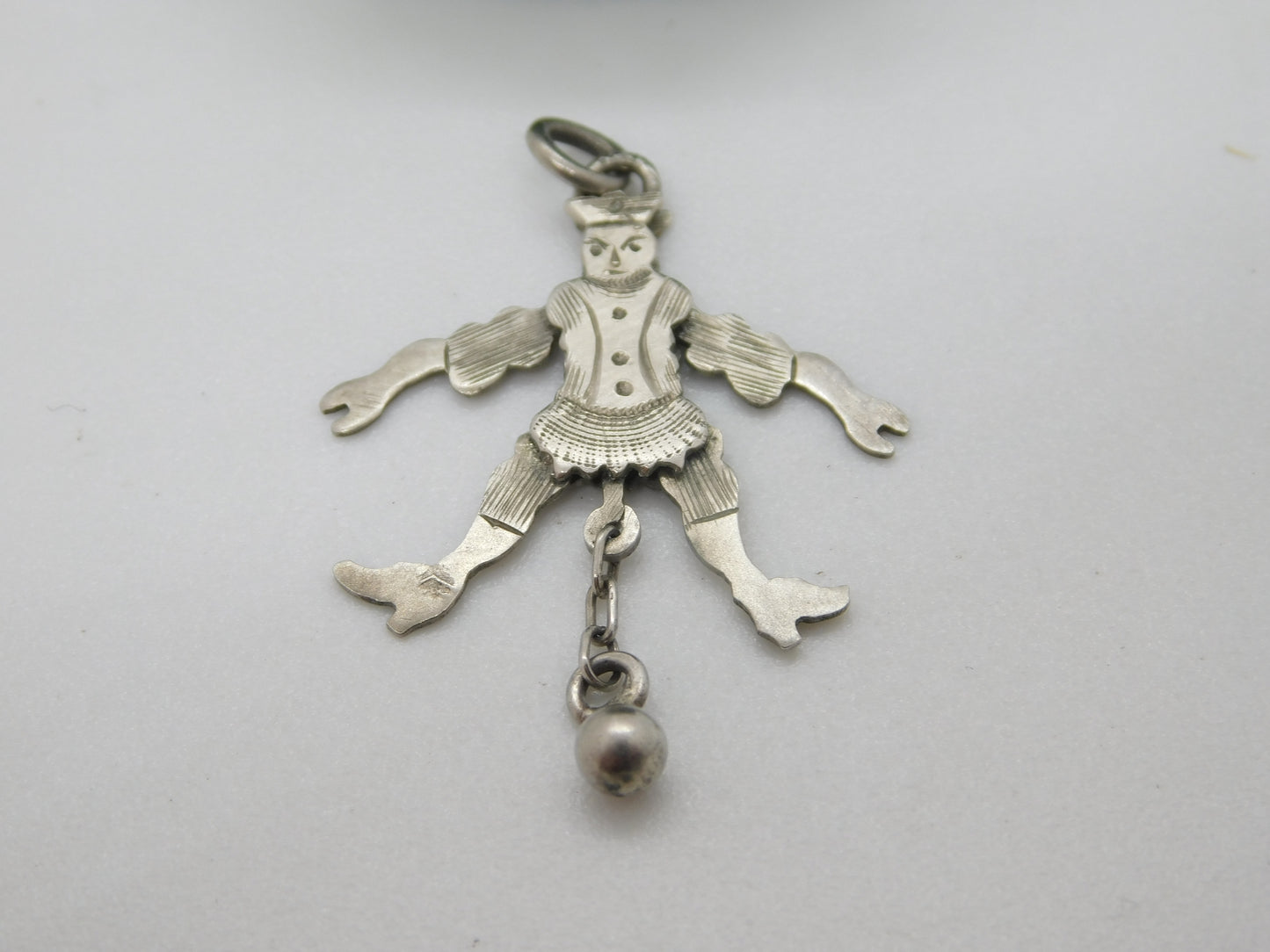 Edwardian Sterling Silver Articulated Clown with Ball Pendant c1910 Antique