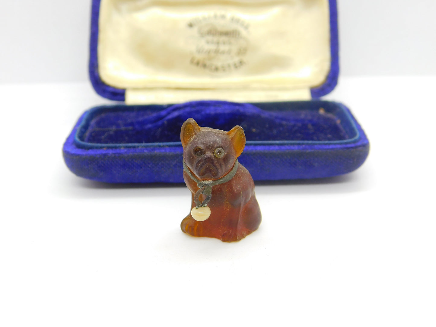 Czechoslovakian Amber Glass Pug Dog Cracker Charm or Keepsake Antique c1920