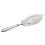 Silver cake server with decorative handle on a light gray background