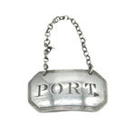 Silver 'PORT' label on a white background