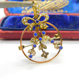 Edwardian 9ct Yellow Gold, Seed Pearl & Sapphire Paste Floral Ribbon Pendant