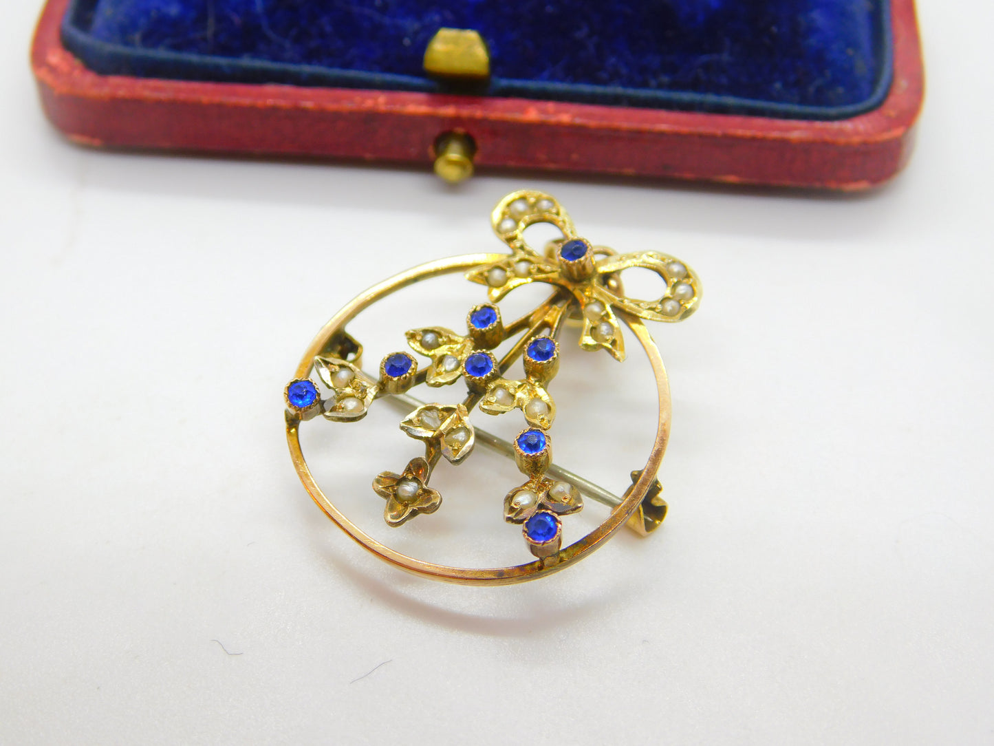 Edwardian 9ct Yellow Gold, Seed Pearl & Sapphire Paste Floral Ribbon Pendant