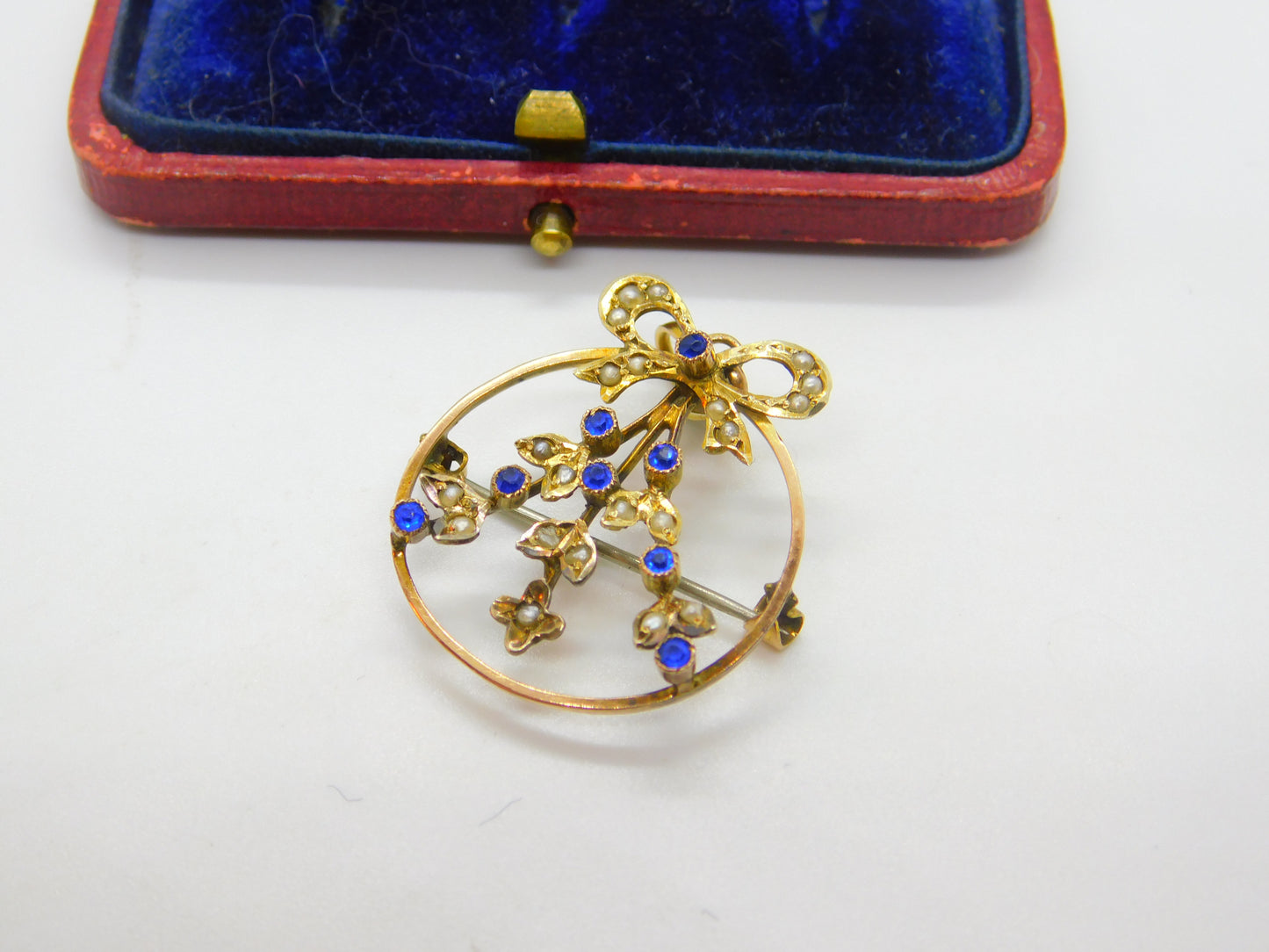 Edwardian 9ct Yellow Gold, Seed Pearl & Sapphire Paste Floral Ribbon Pendant