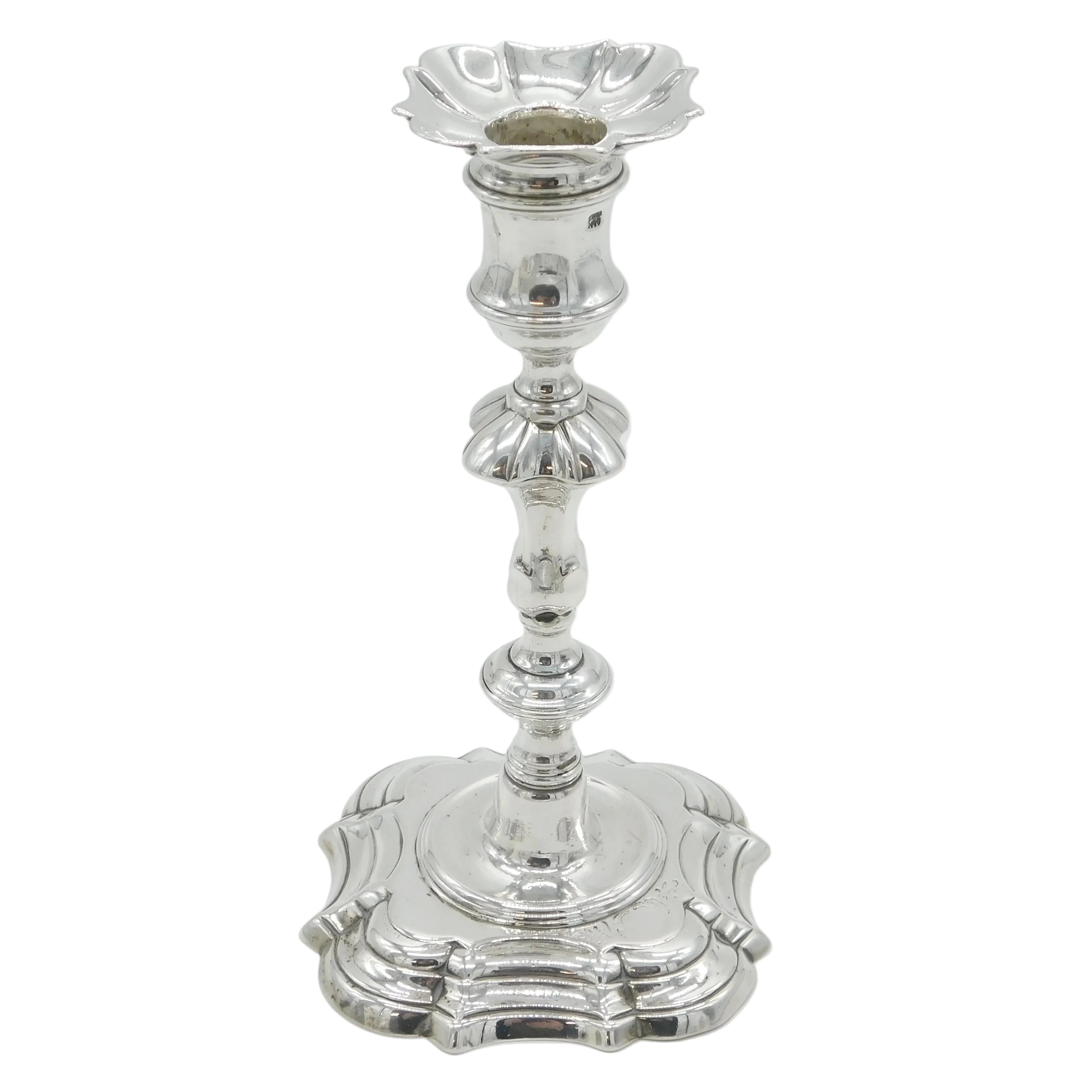 Silver candlestick holder on a white background