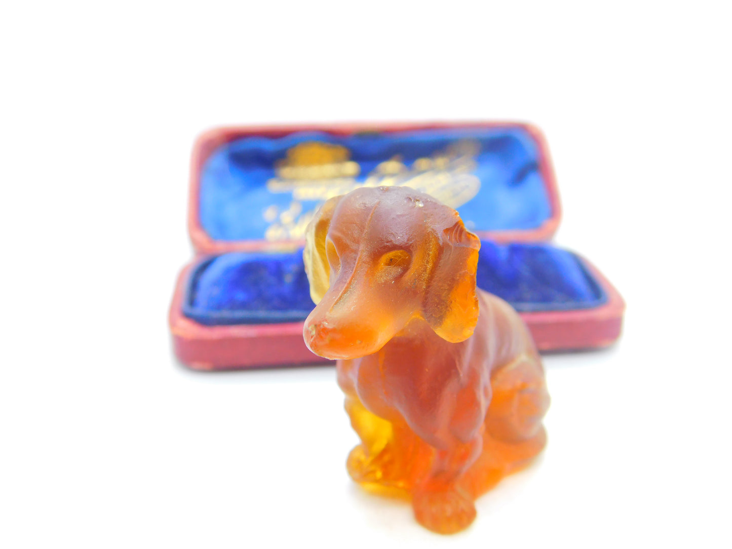 Large Czech Amber Glass Cracker Charm in Dachshund Dog Form Antique c1920