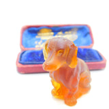 Large Czech Amber Glass Cracker Charm in Dachshund Dog Form Antique c1920
