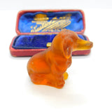 Large Czech Amber Glass Cracker Charm in Dachshund Dog Form Antique c1920