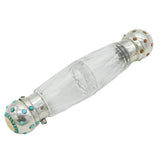 Clear glass bottle with silver and turquoise accents on a white background