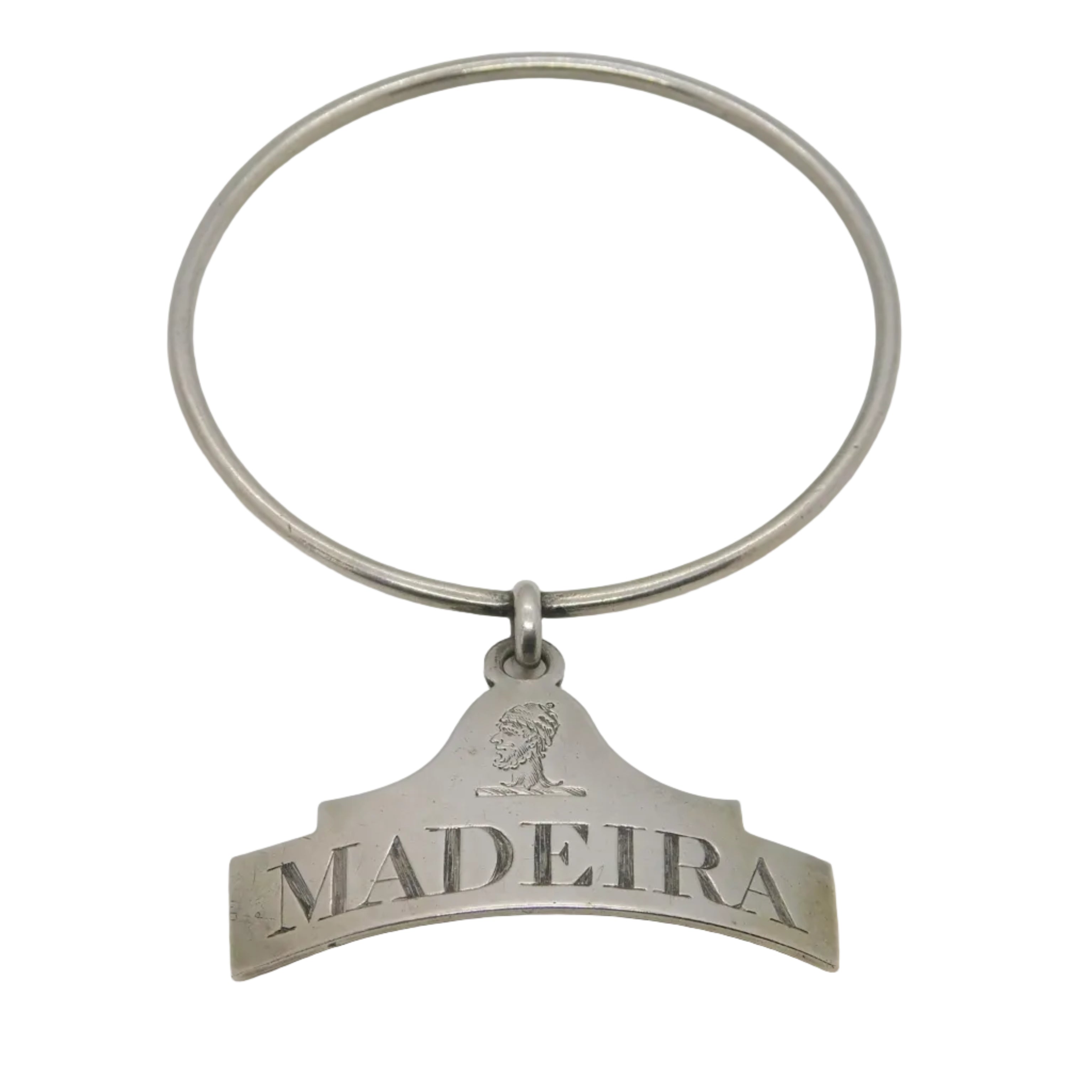 Antique Georgian sterling silver bright cut madeira bottle neck collar label with 'MADEIRA' text and a crest above the writing, hallmarked London 1805.