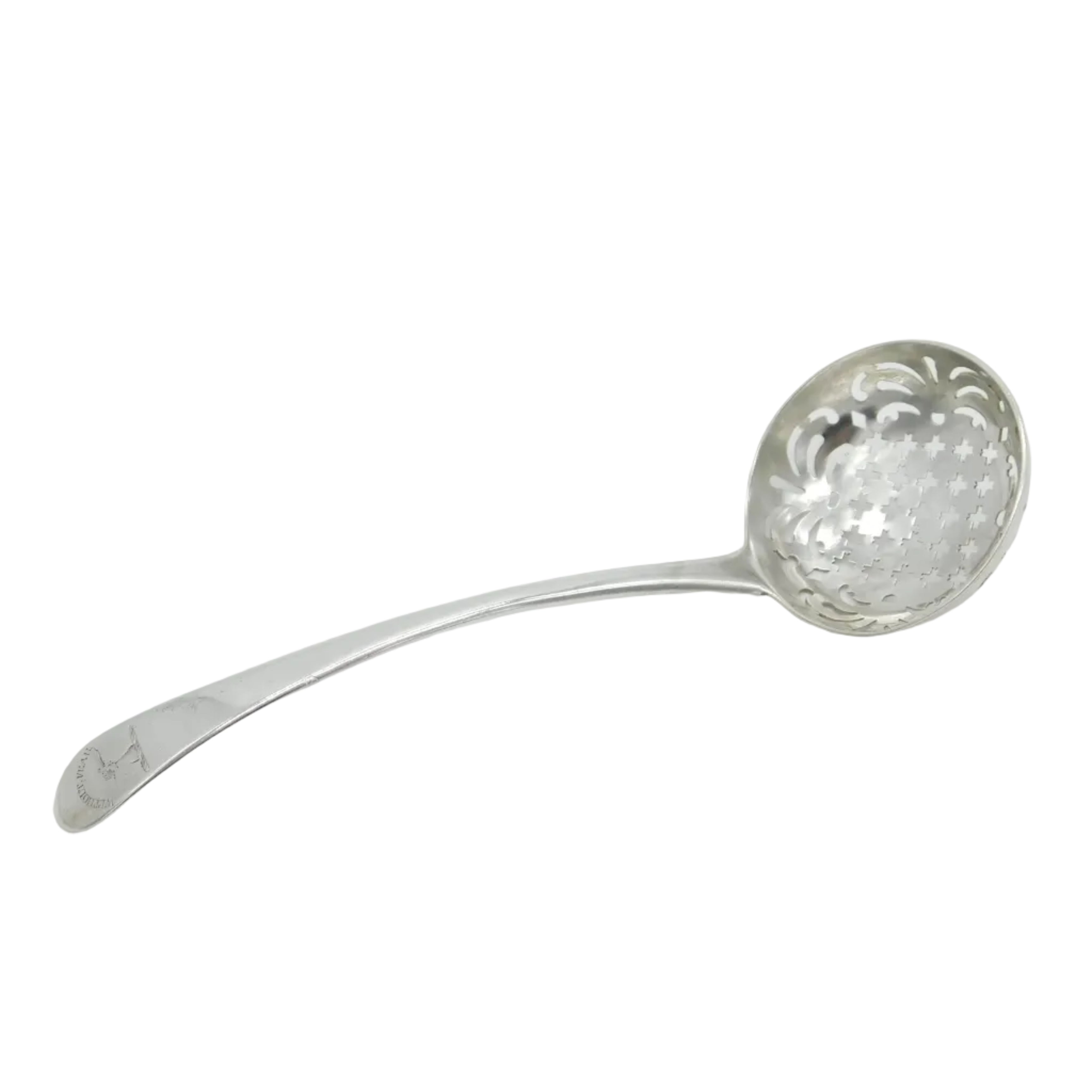 An antique early georgian sterling silver sugar caster spoon with a crest on the handle, hallmarked to the reverse with rubbed marks.