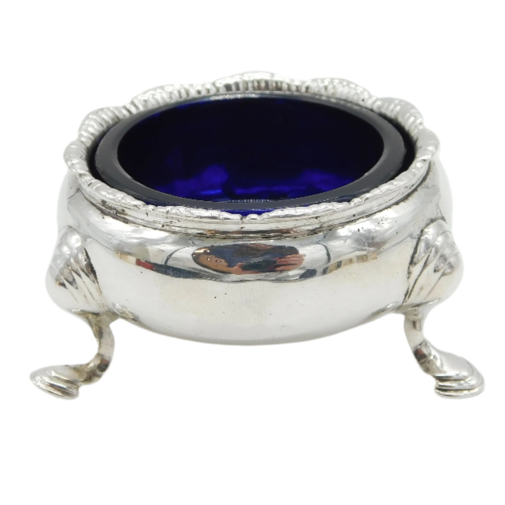 Silver container with blue interior on a white background