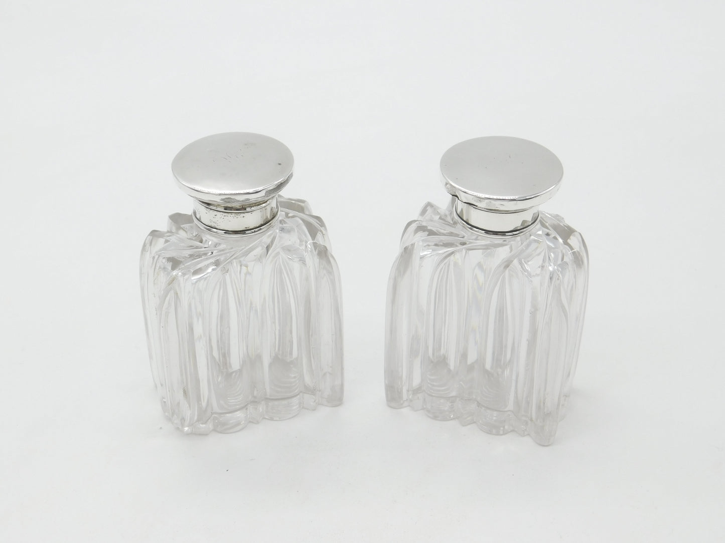 Victorian Pair of Sterling Silver Topped Swirling Glass Scent Bottles c1850