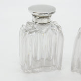 Victorian Pair of Sterling Silver Topped Swirling Glass Scent Bottles c1850