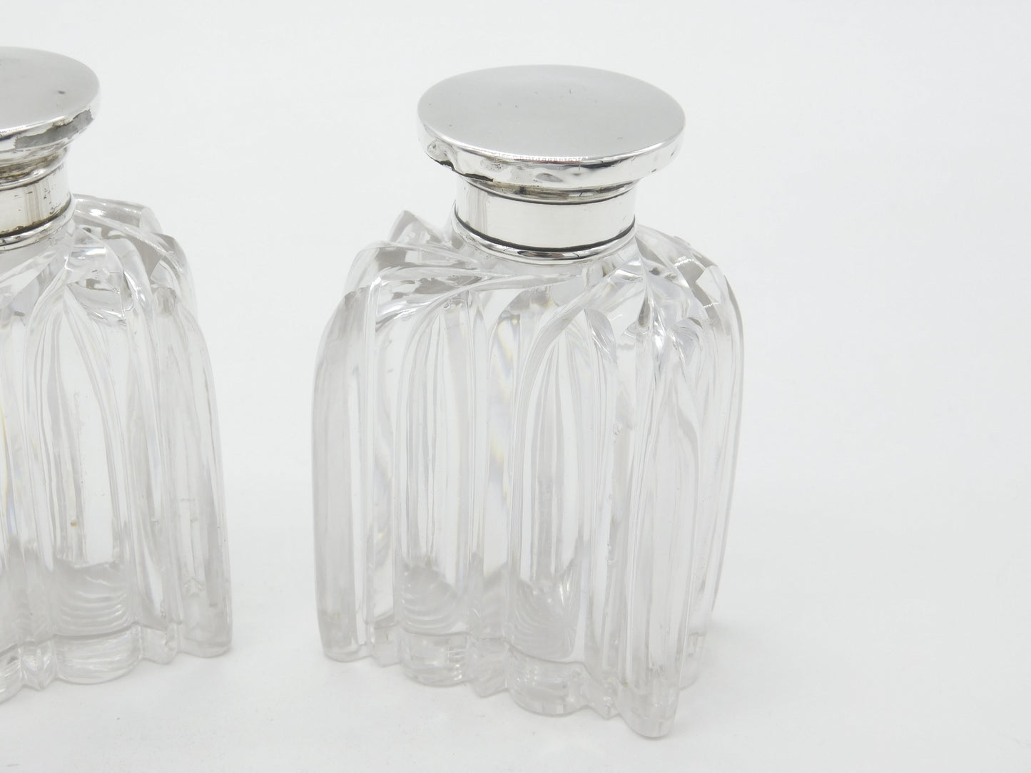 Victorian Pair of Sterling Silver Topped Swirling Glass Scent Bottles c1850