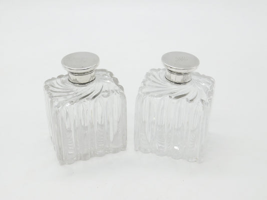 Pair of Victorian Sterling Silver Topped Swirling Glass Perfume Bottles c1850