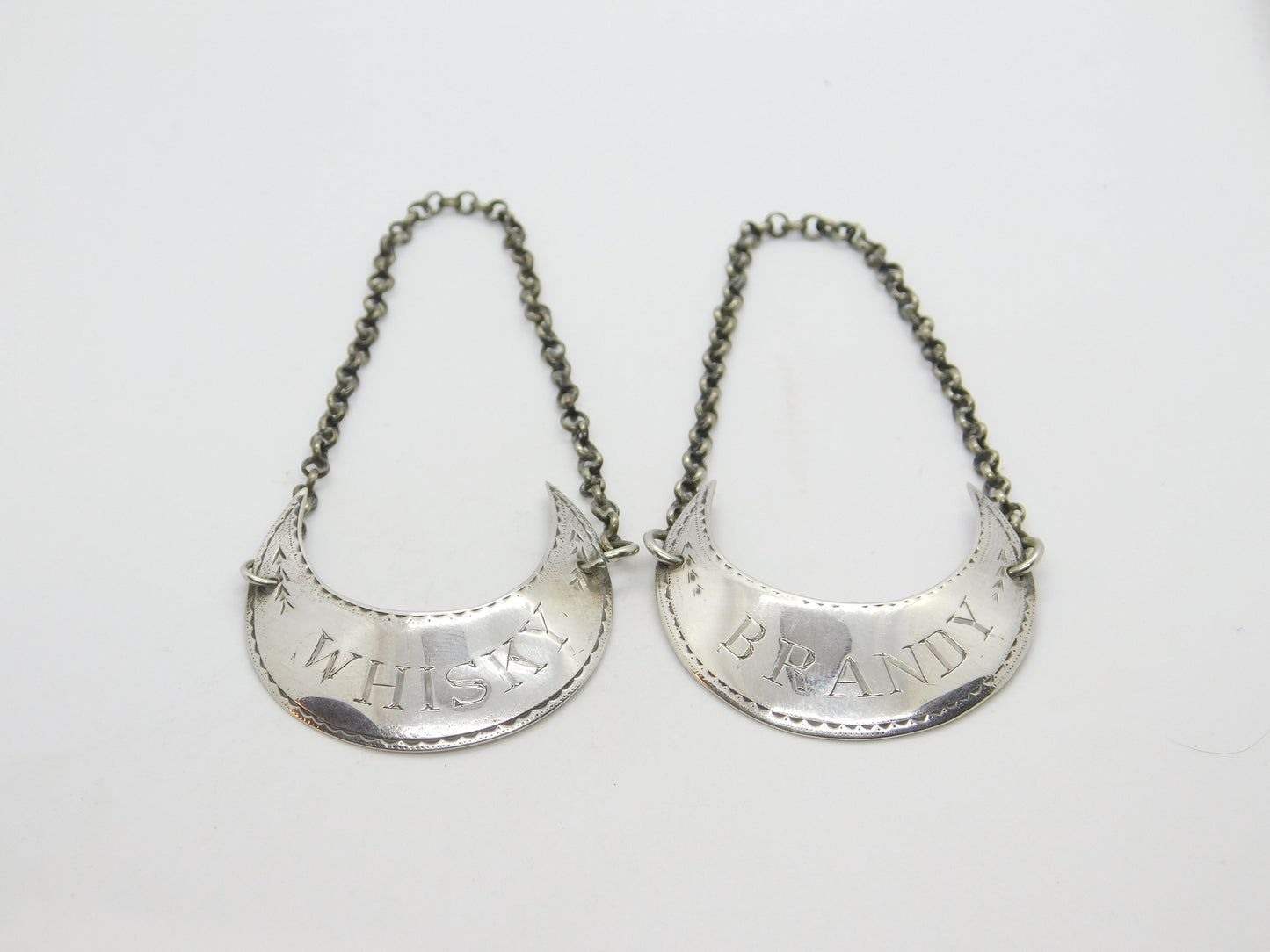 Pair of Georgian Sterling Silver Crescent Whisky & Brandy Decanter Labels 1798