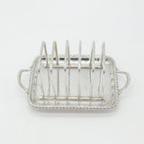 Edwardian Sterling Silver Toast Rack with Integrated Crumb Tray 1908 London