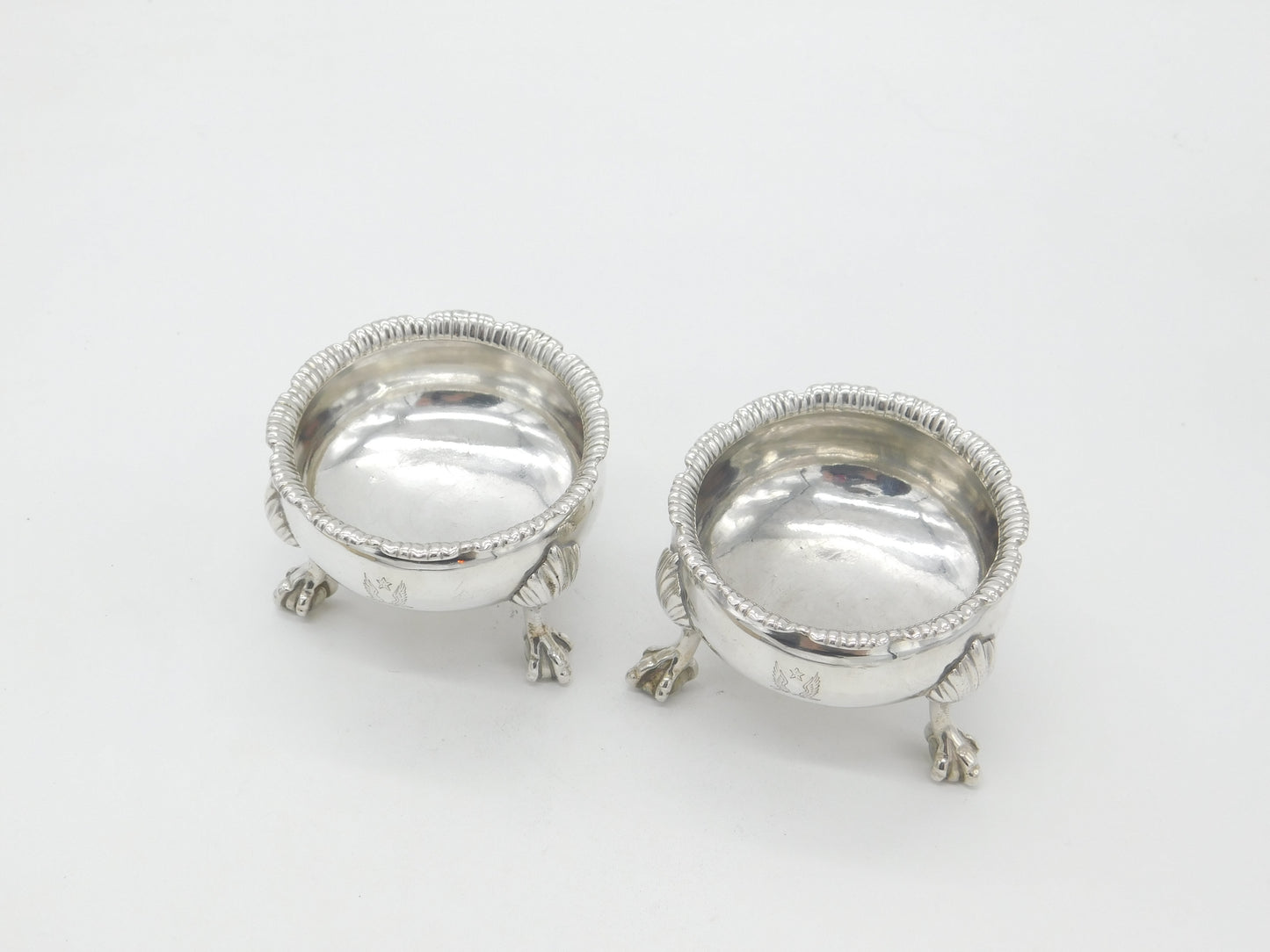 Pair of Georgian Sterling Silver Paw Foot Crested Salt Cellars 1763 London