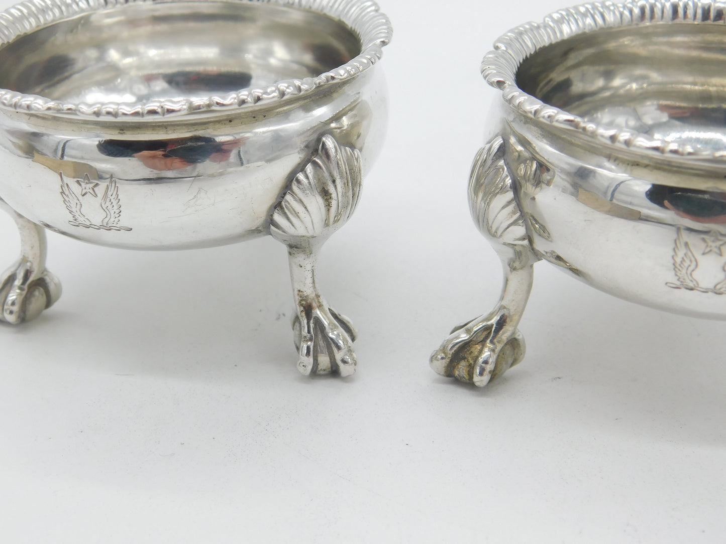 Pair of Georgian Sterling Silver Paw Foot Crested Salt Cellars 1763 London