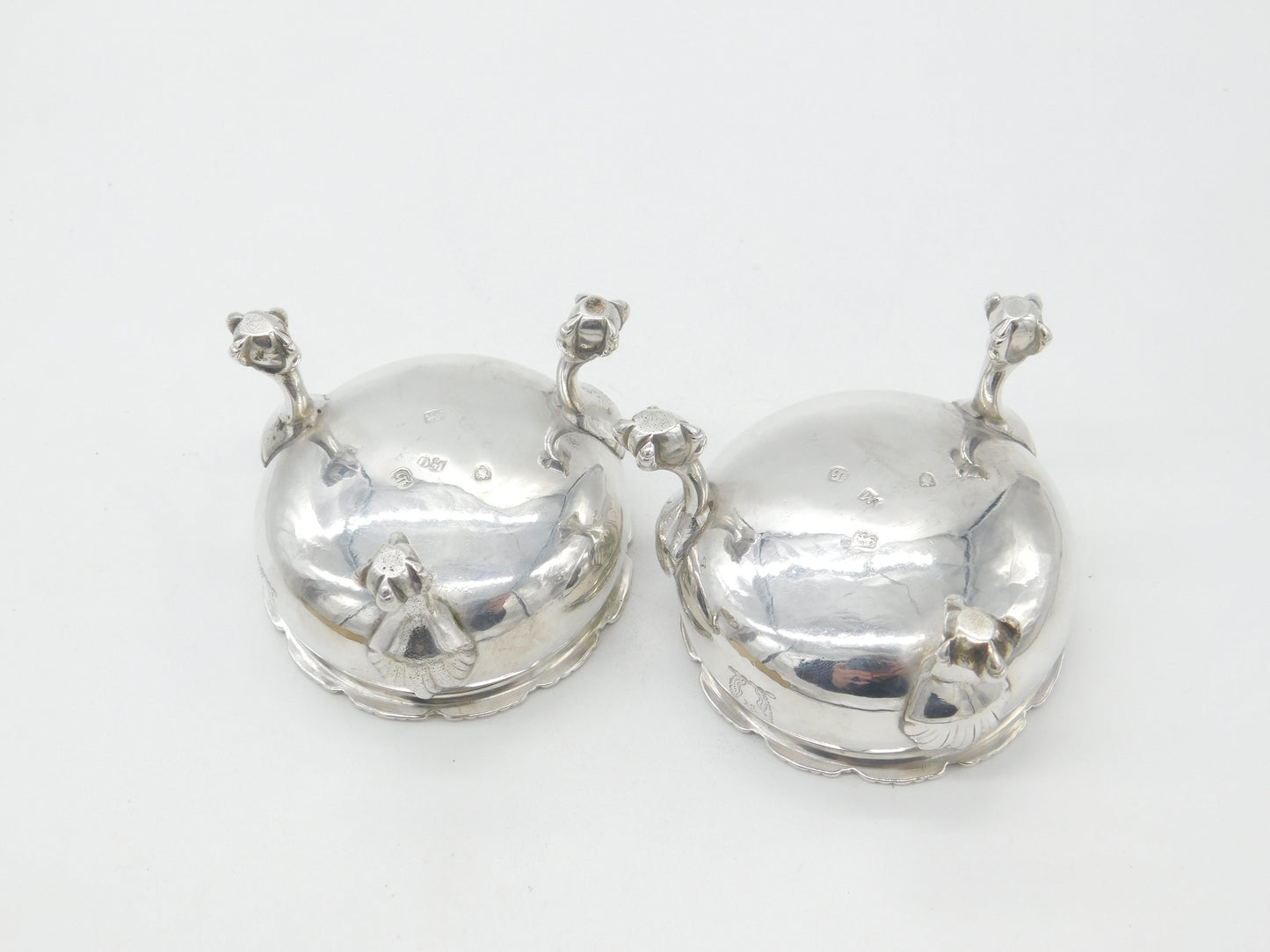 Pair of Georgian Sterling Silver Paw Foot Crested Salt Cellars 1763 London