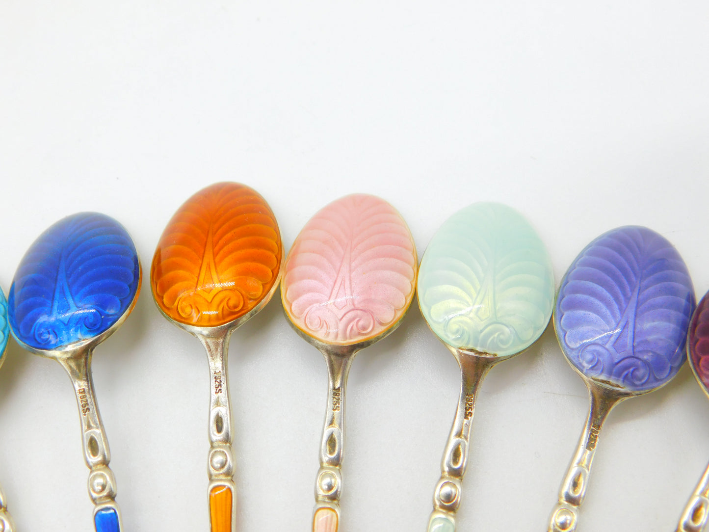 Set of Ten Scandinavian Sterling Silver Rainbow Guilloche Enamel Teaspoons c1920