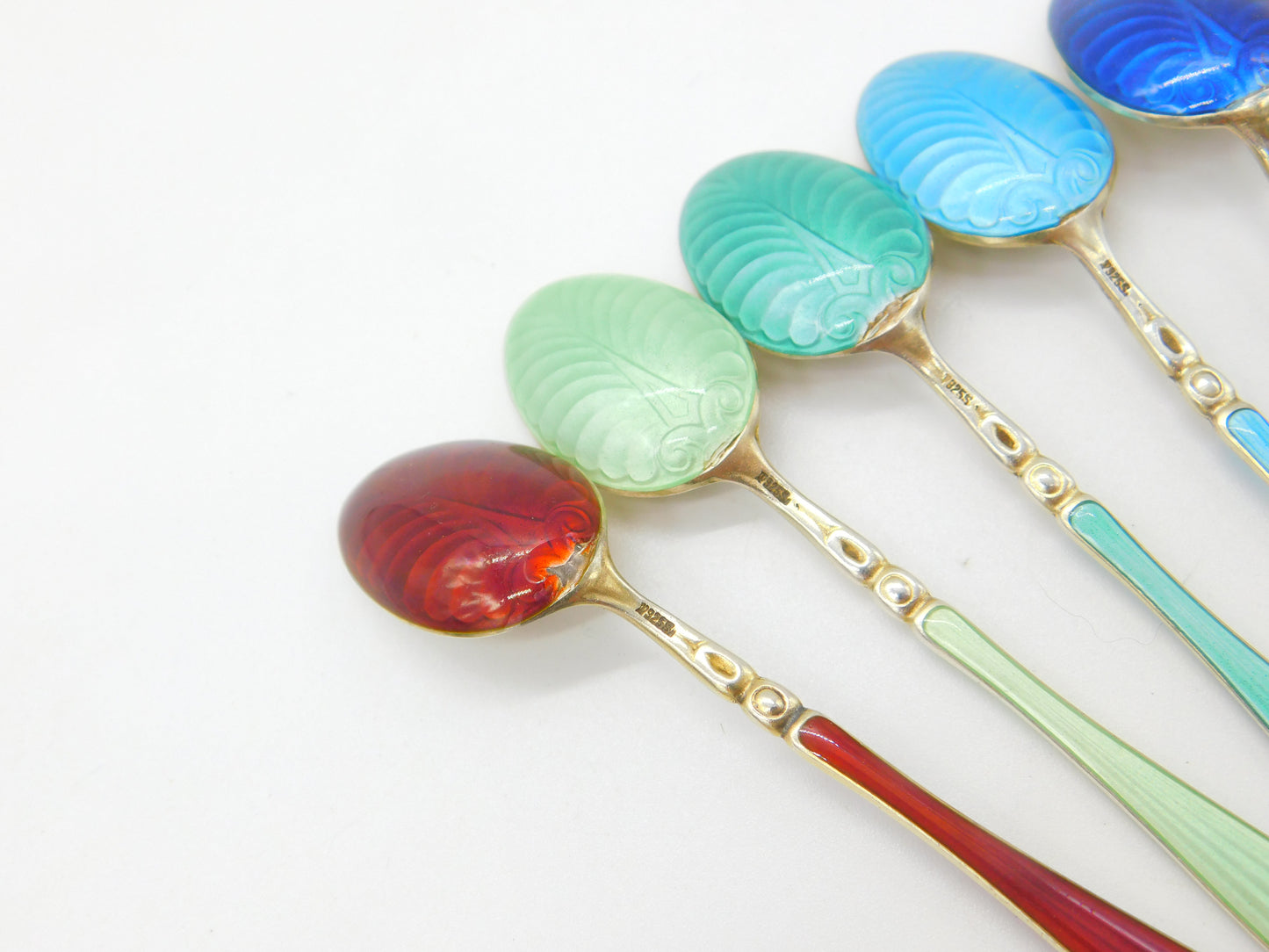 Set of Ten Scandinavian Sterling Silver Rainbow Guilloche Enamel Teaspoons c1920