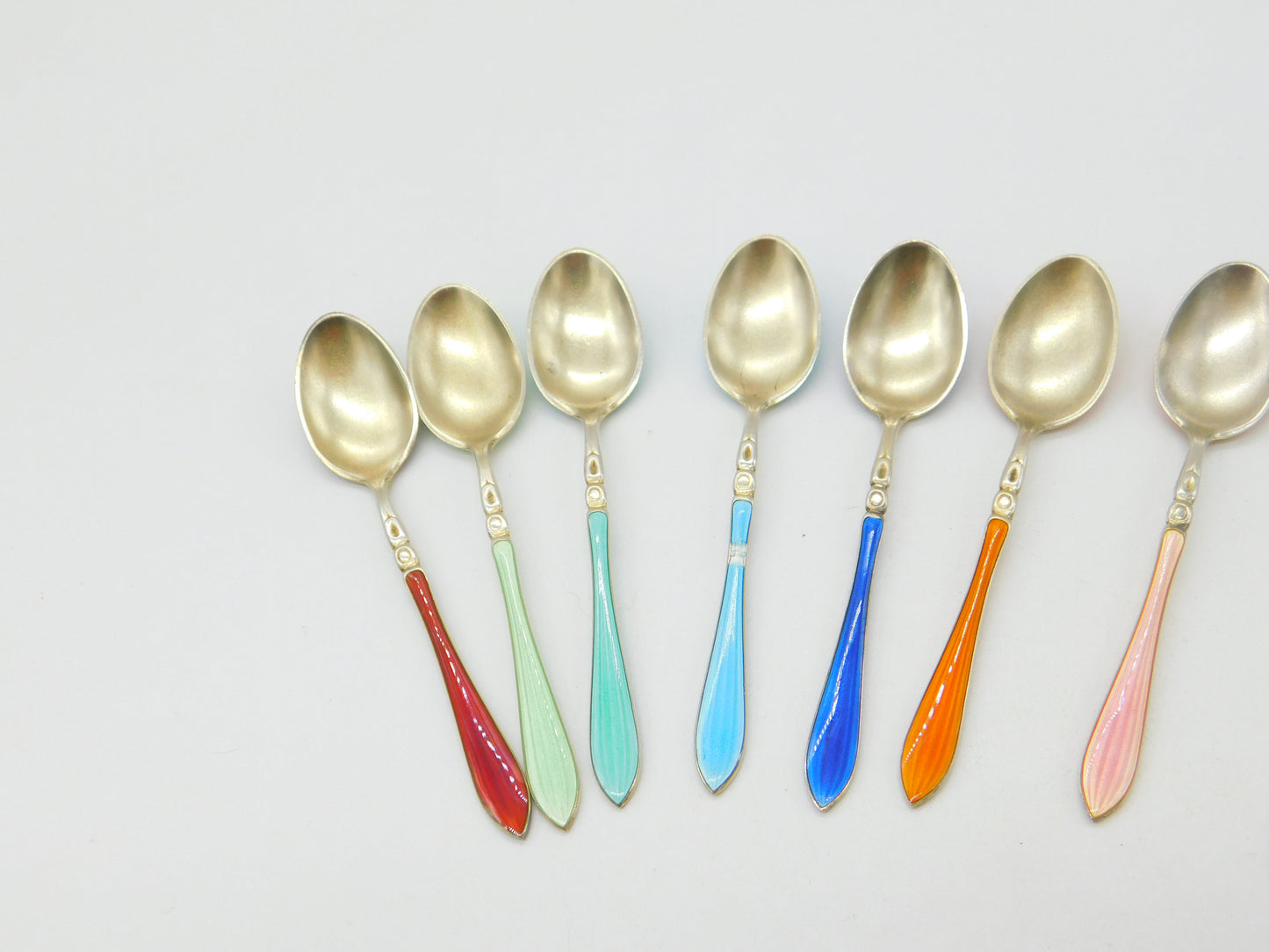 Set of Ten Scandinavian Sterling Silver Rainbow Guilloche Enamel Teaspoons c1920