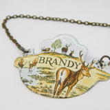 20th Century Bilston Enamel Watering Stag Brandy Decanter Label Antique c1900