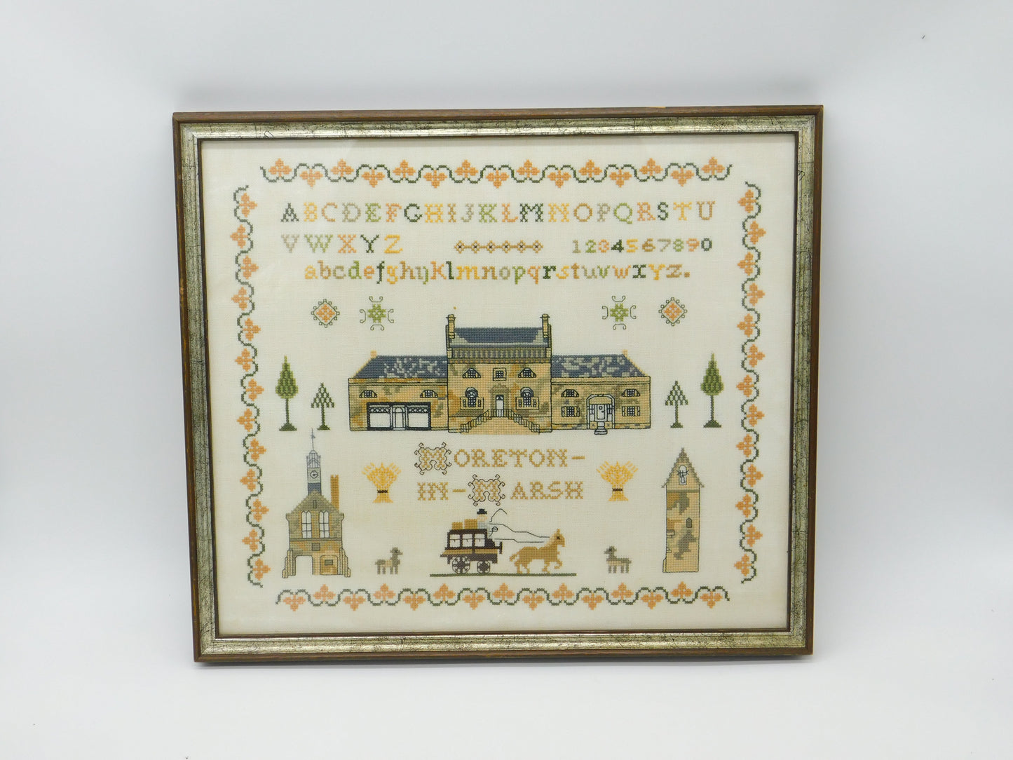 Framed Needlework Wool Sampler of 'The Horns Family Home in Moreton-In-Marsh'