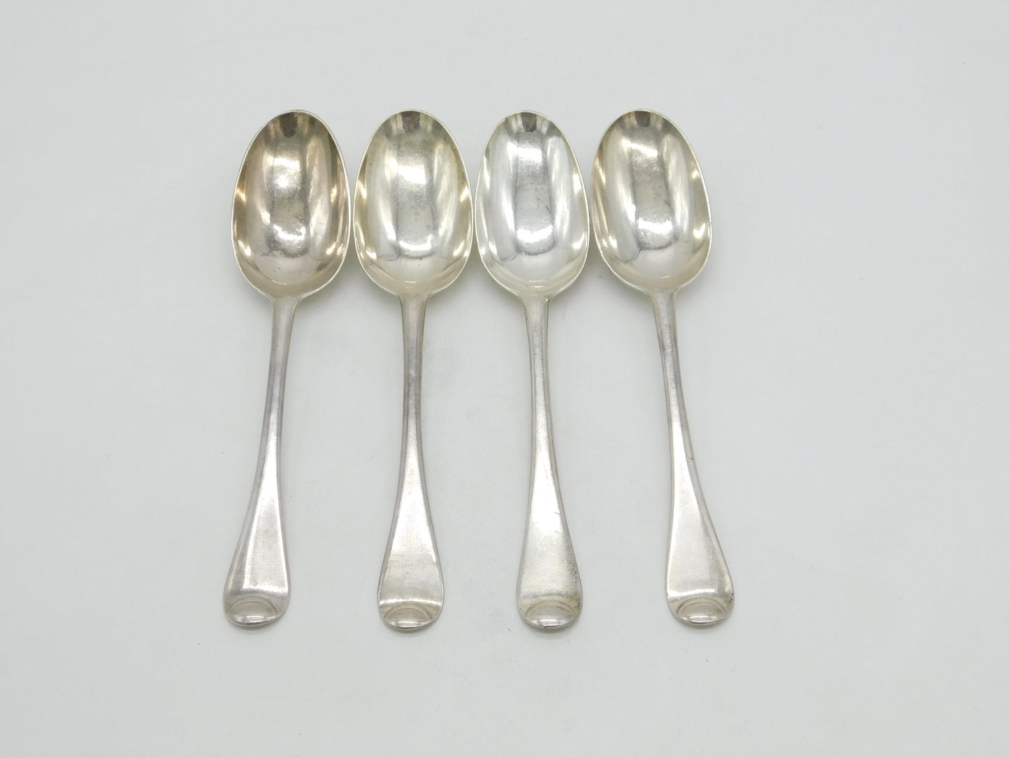 George I Britannia Silver Set of Four Armorial Serving Spoons Antique 1721 London