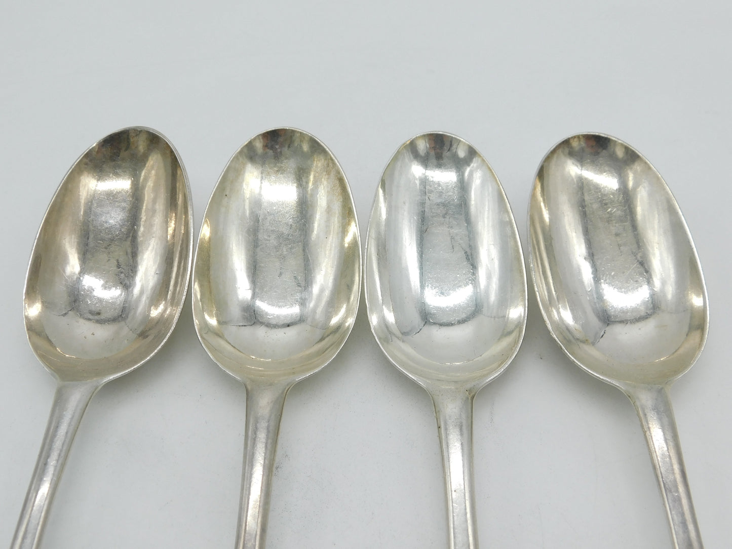 George I Britannia Silver Set of Four Armorial Serving Spoons Antique 1721 London