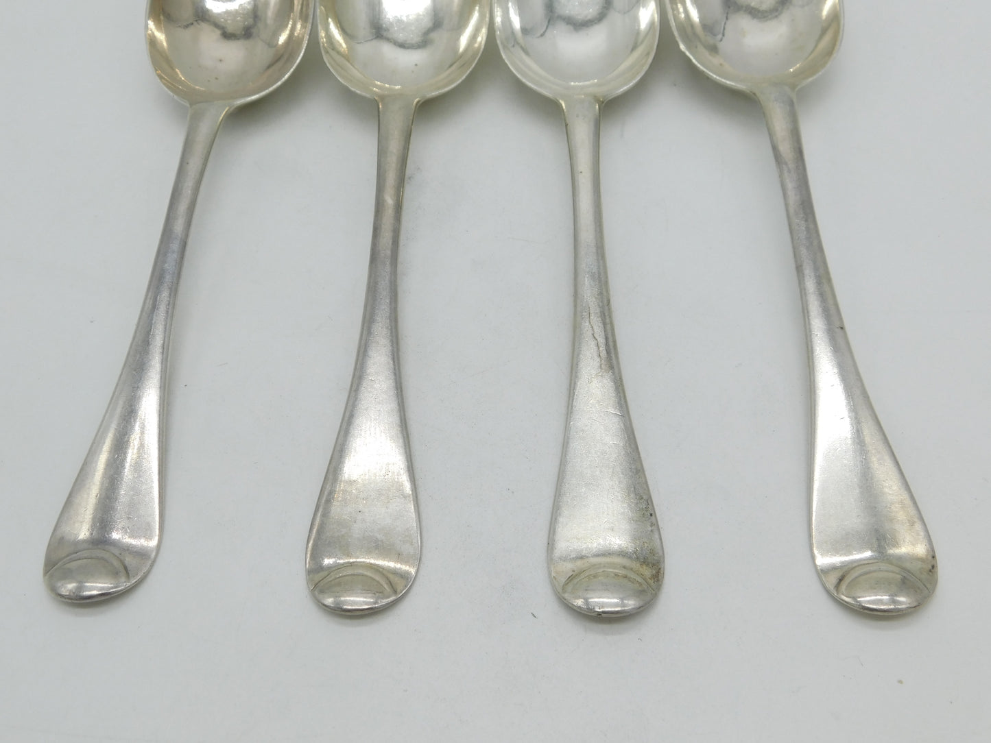 George I Britannia Silver Set of Four Armorial Serving Spoons Antique 1721 London